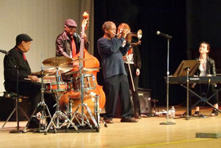 five piece jazz band on stage