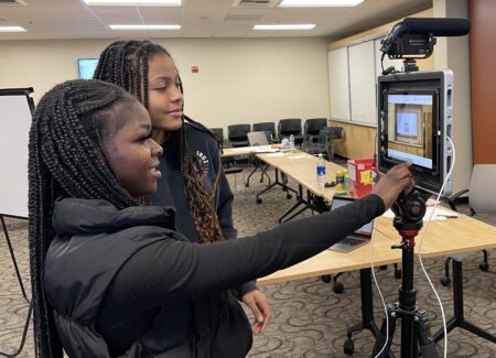 Student leaders in the Countywide Black Student Union, part of the Youth Led Leadership Alliance, work on an informational video about pre-registration to vote in February 2024.